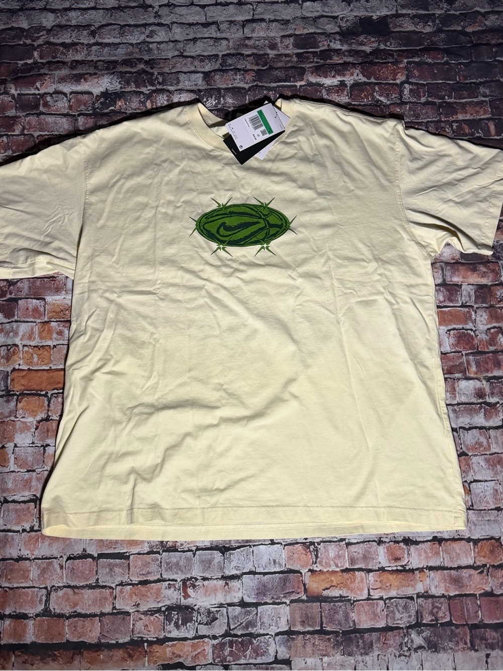 Nike Cream Short-Sleeve Tee with Green Logo
